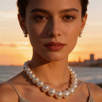 Broome Strawberry Pearl Stand with a Gold and Diamond Clasp